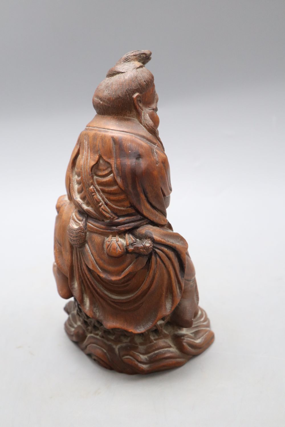 A Chinese bamboo figure of a fisherman, late 19th/early 20th century, H. 23.5cm